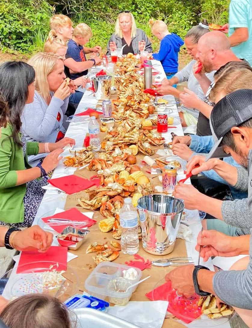 cajun crab boil spread across tables to feed a crowd