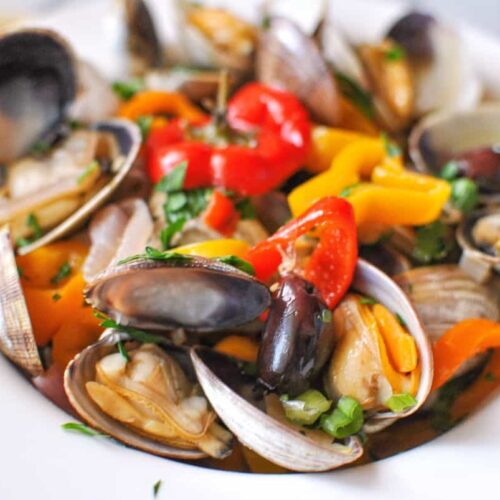 Mediterranean steamed clams with white wine peppers shallots olives