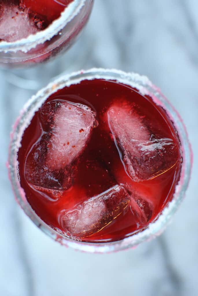 deep red drink over ice in gobler glass
