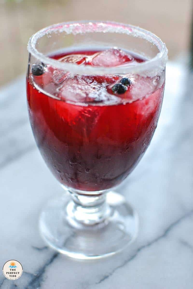 bright deep purple red huckleberry margarita alcoholic drink