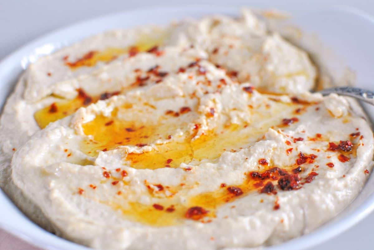 hummus with extra virgin olive oil and aleppo pepper spice
