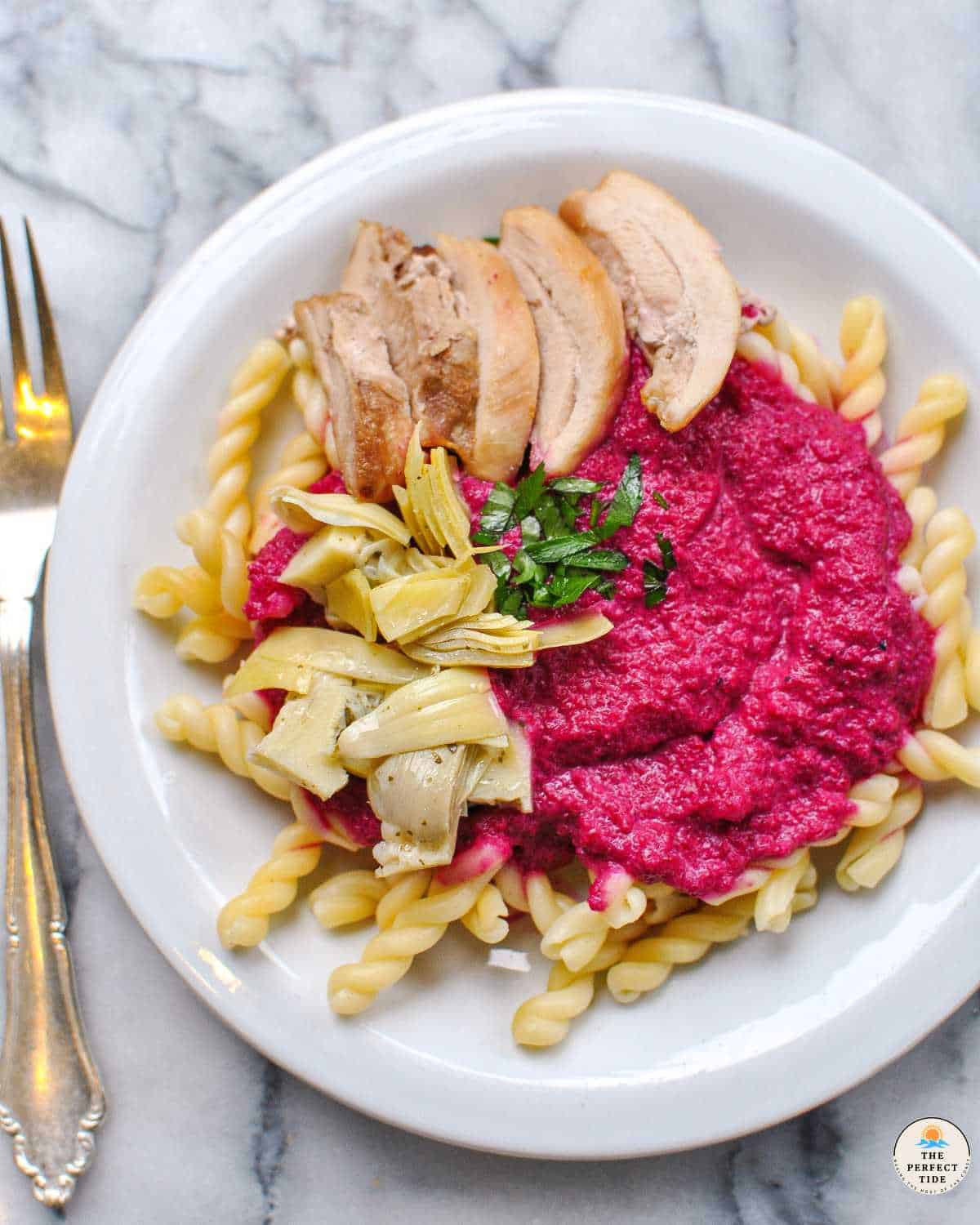 creamy beet sauce pasta with toppings for valentines day dinner