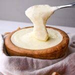 lebanese garlic sauce toum in a olive oil bowl