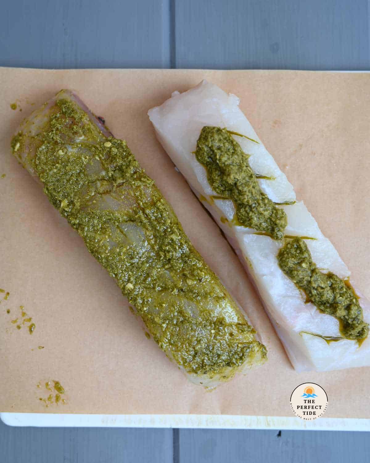 pesto crusted halibut on parchment paper