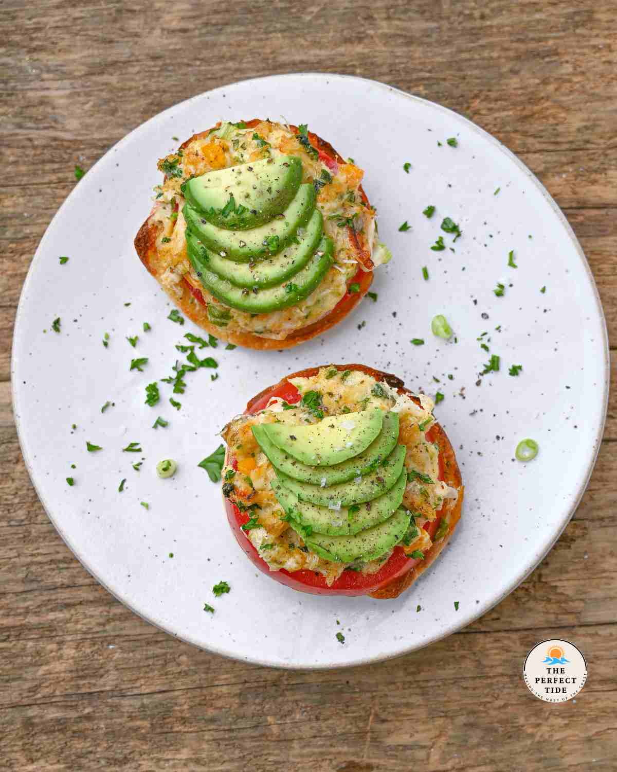 crab melt sandwiches on english muffins with tomato cheese and avocado