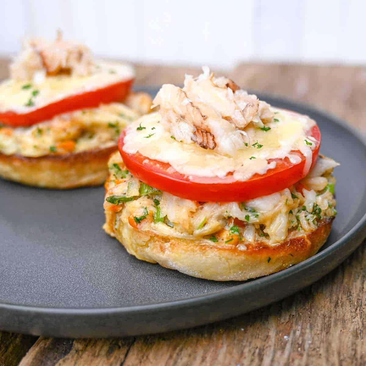 crab melt on english muffin with tomato cheese and fresh crab meat