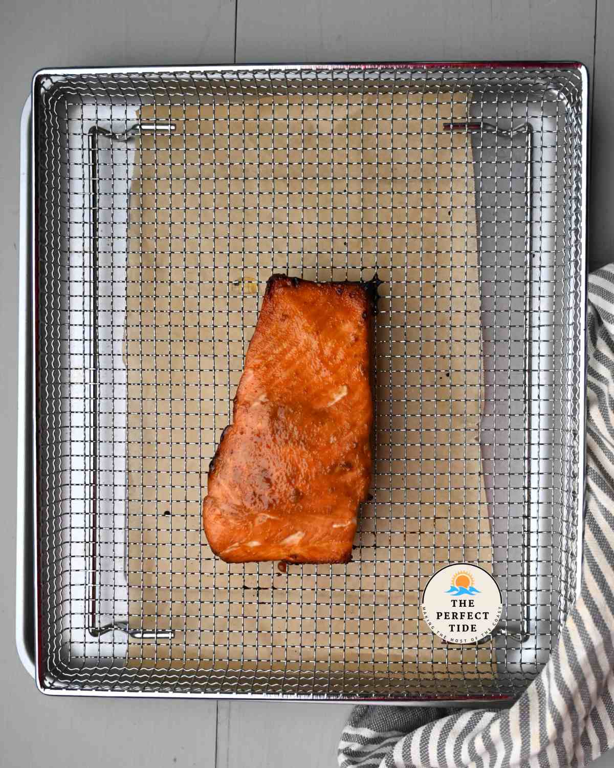 air fried teriyaki salmon on air fryer basket