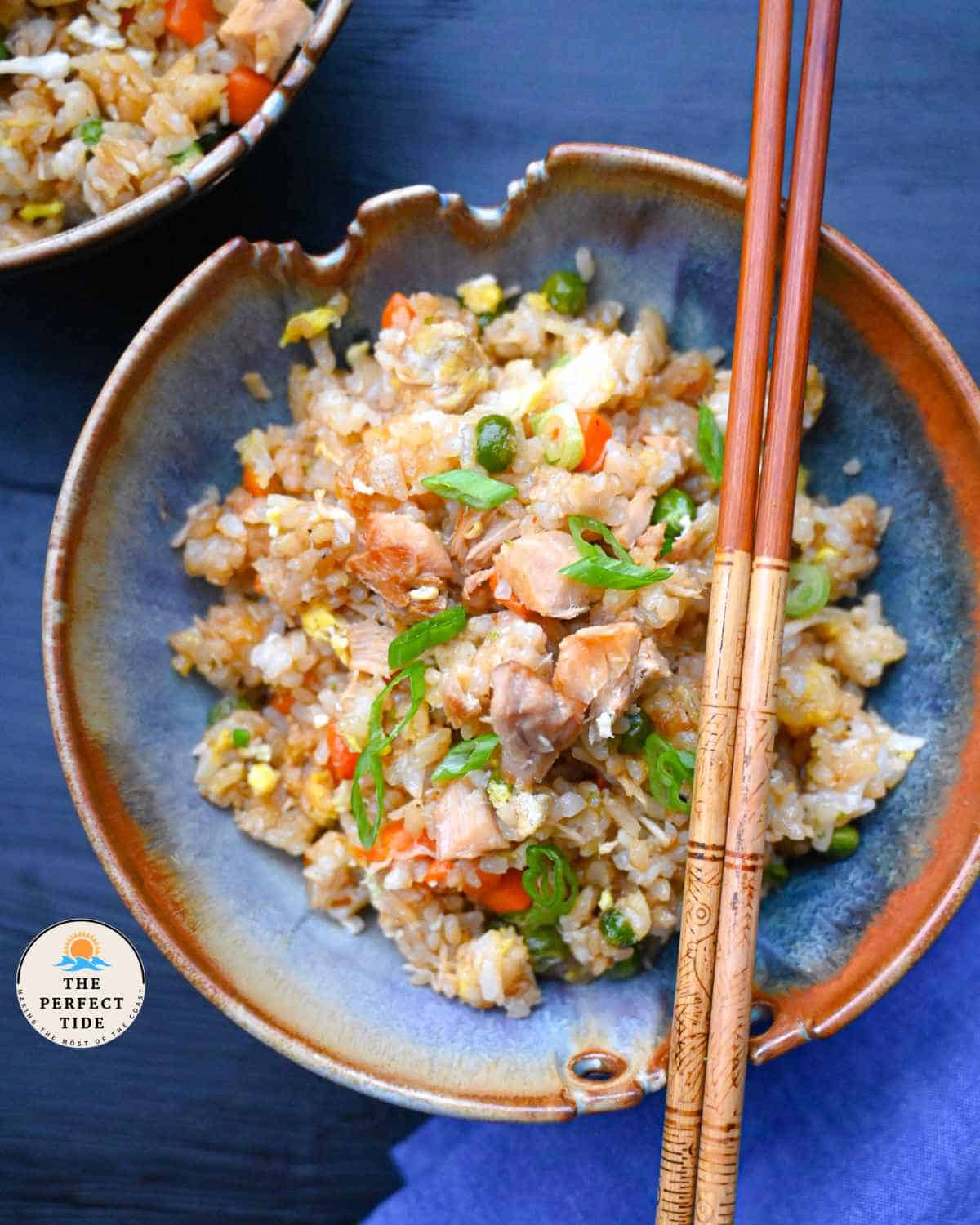 fried rice with tuna in a japanese chopstick bowl