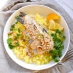 samke harra with harra sauce toasted walnuts and pinenuts cilantro and saffron rice