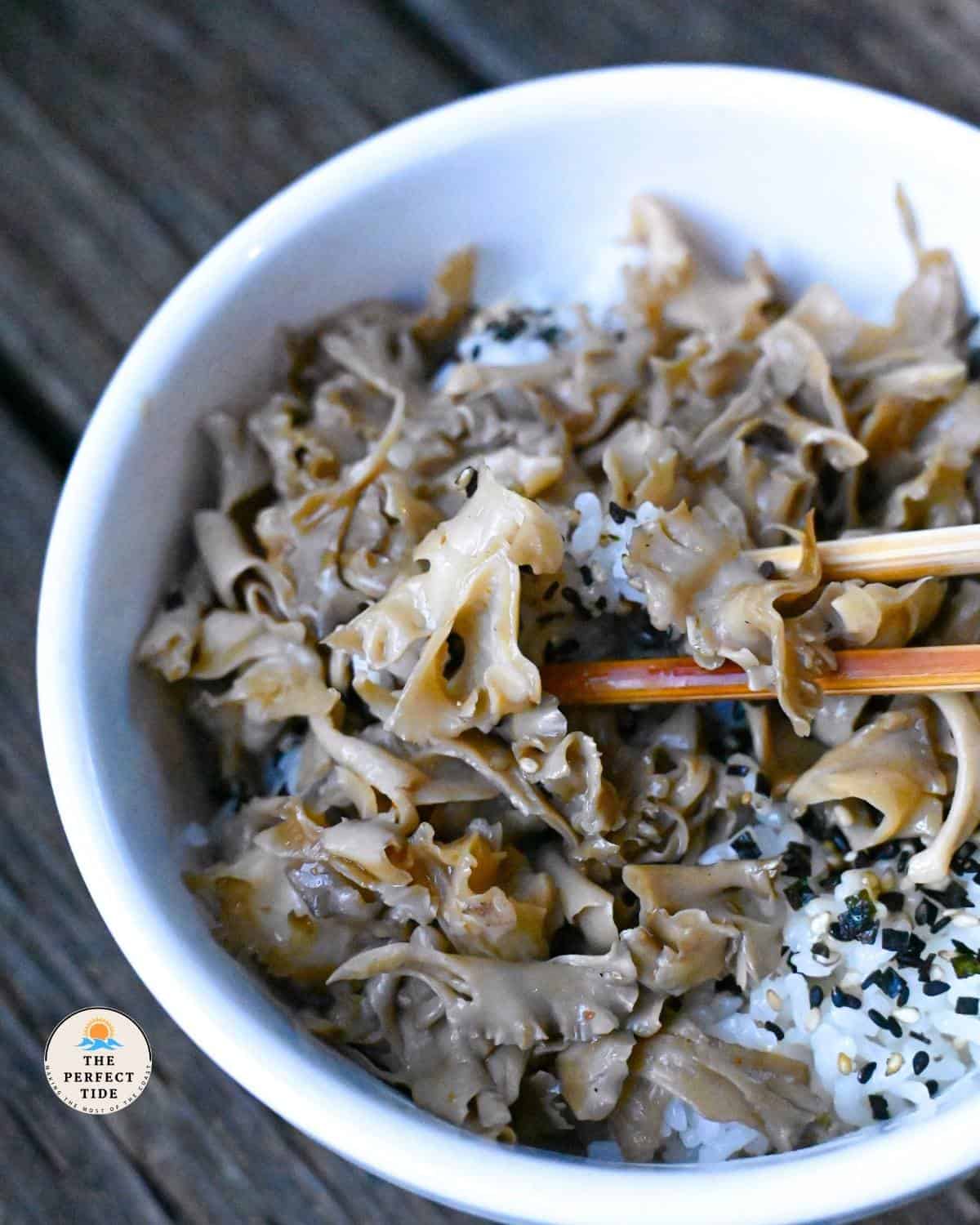 sauteed cauliflower mushrooms in rice bowl