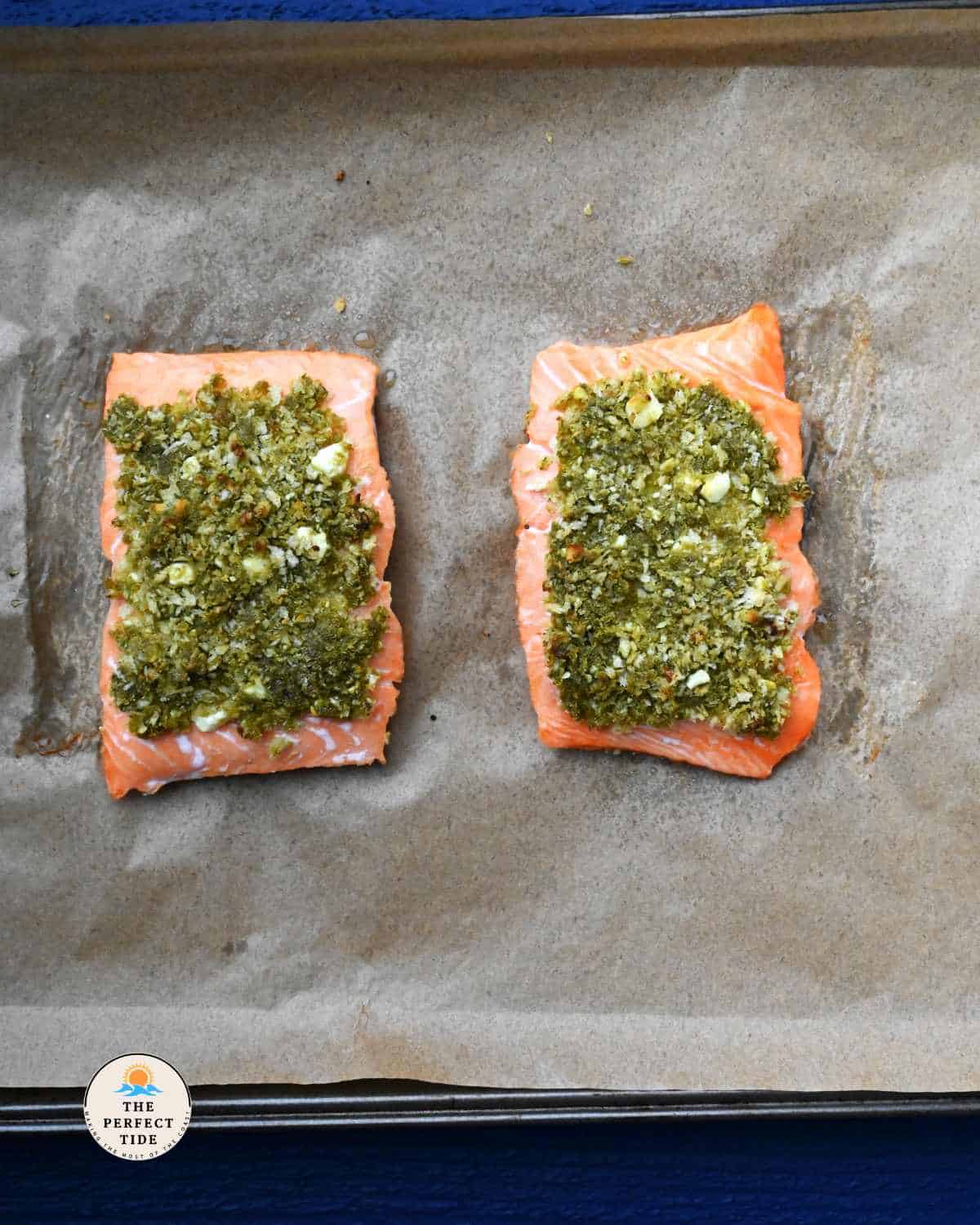 pesto crust on salmon on a parchment paper | how to make pesto crusted salmon
