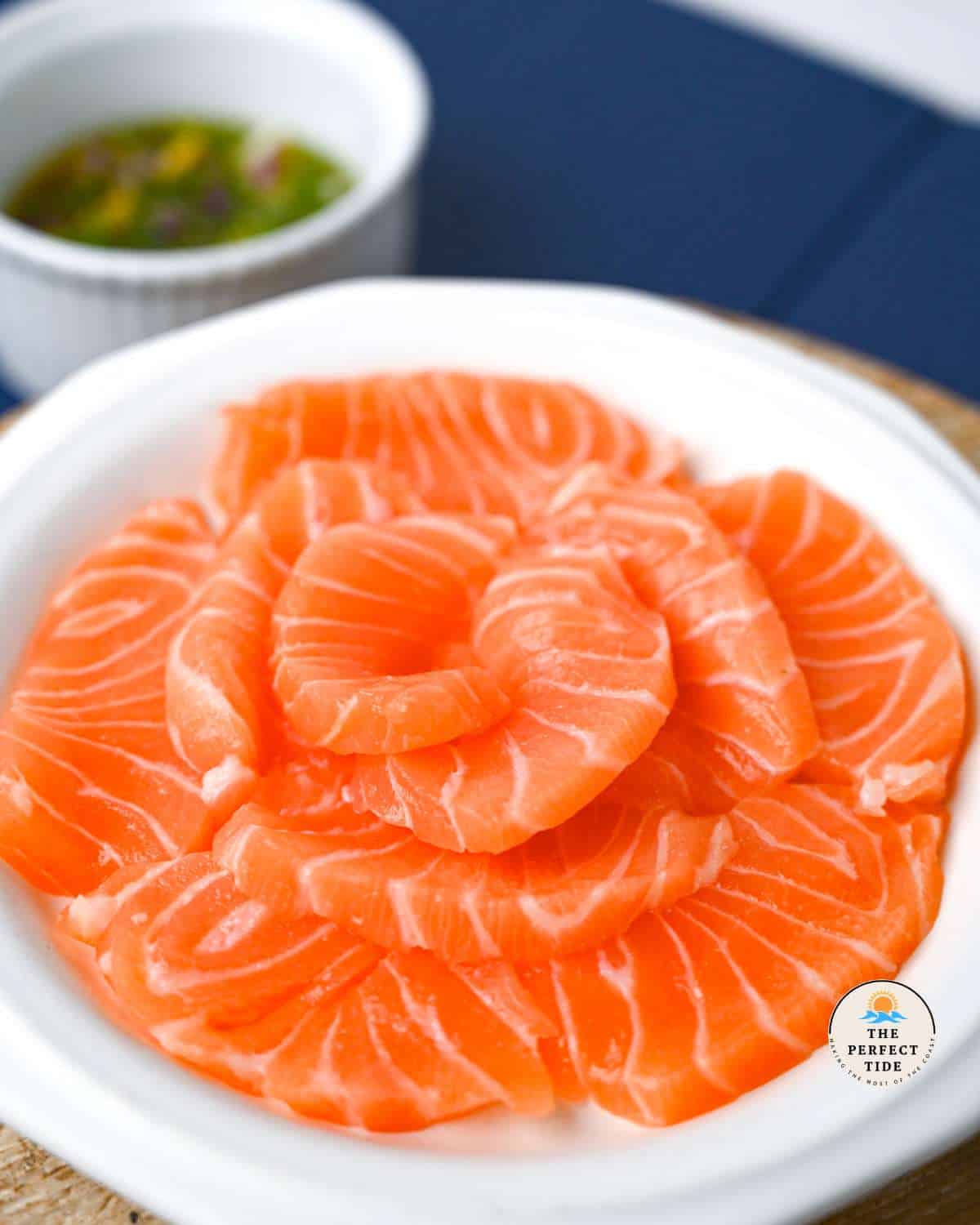raw salmon on a dish for salmon crudo ingredients picture