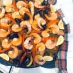 paella with shrimp mussels sausage and chicken in a paella pan