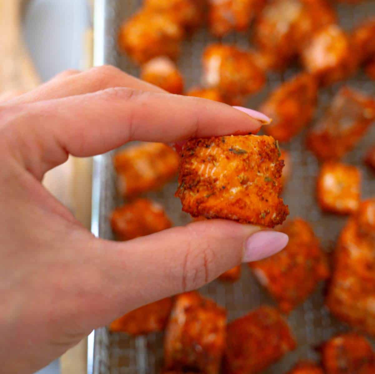 holding crispy salmon bites