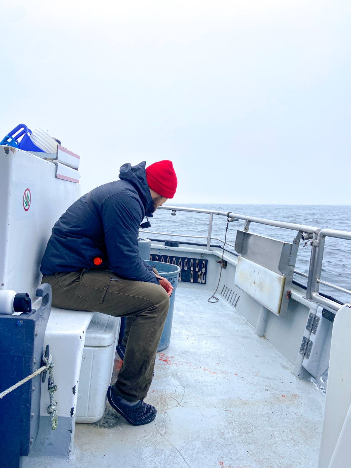 MAN SITTING IN FISHING CHARTER